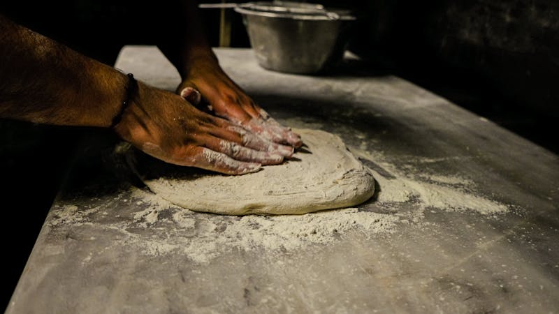Anthony's coal fired pizza kitchen team at work
